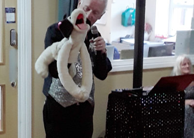 Entertainers used puppets and wigs to make residents laugh