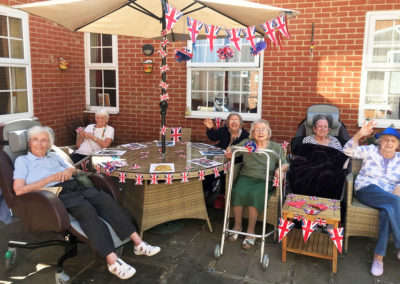 Residents on VE Day in the garden