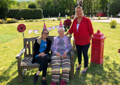 Princess Christian Care Home resident and staff enjoying the sunny front garden on VE Day 2020
