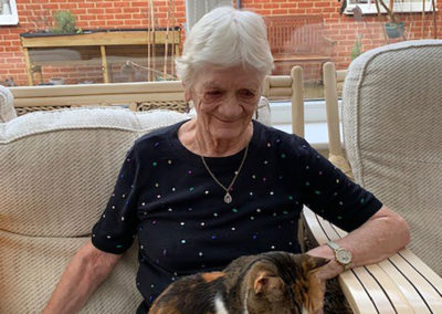 Princess Christian Care Home resident with a cat on her lap