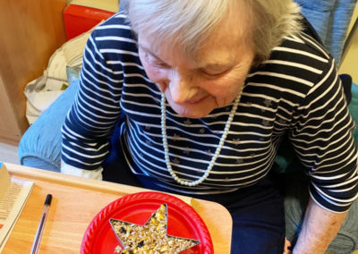 Making and decorating bird feeders at Princess Christian Care Home 5