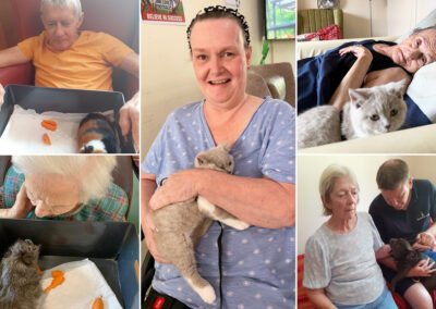 Princess Christian Care Home residents enjoying time with a kitten, puppy and Guinea pigs