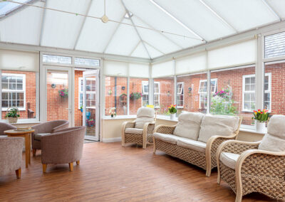 Conservatory lounge area in Princess Christian's Pirbright Unit