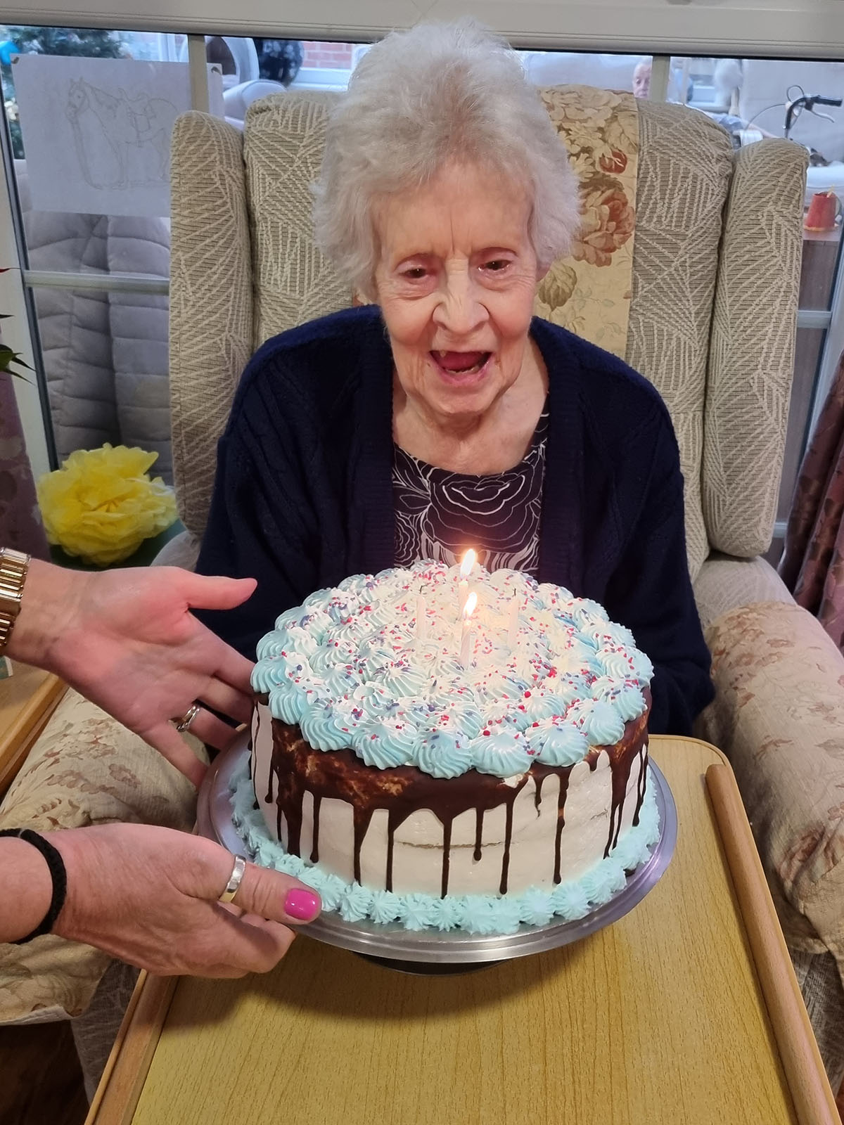 Pat with her birthday cake at Princess Christian Care Home